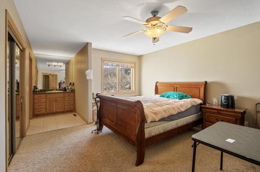 Enjoy ample accommodations with additional upper-level bedrooms, including an en suite bedroom.