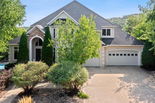 Nestled in the prestigious Arrowhead Pointe neighborhood of Edina, this two-story residence in a private cul-de-sac offers an ideal blend of luxury living and community convenience.