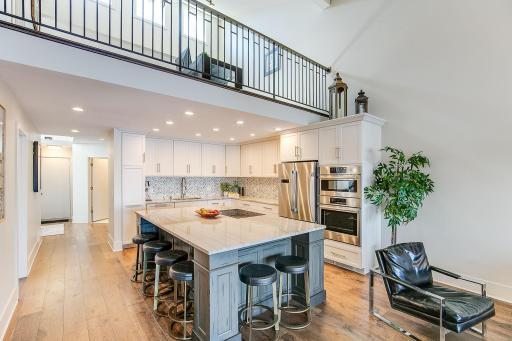 Stainless steel appliances in completely remodeled kitchen