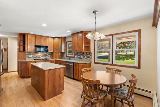 Updated kitchen, new cabinets, granite tops, hardwood floor