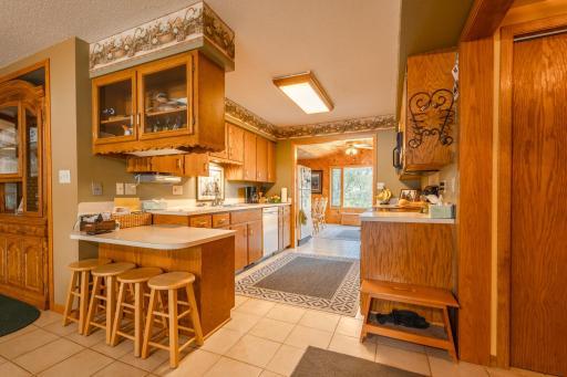 Efficient Galley kitchen offers a place to prep, dine or hangout in conversation.