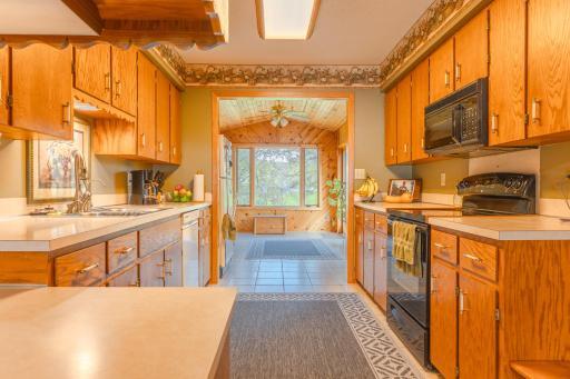 Kitchen & Sunroom offer that sought after lakeside living feel.