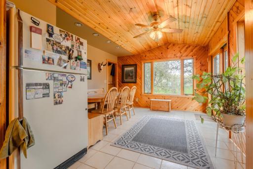 The sunroom addition was completed in 2000. It walks out to the private back yard and patio area. A space with multiple purpose.