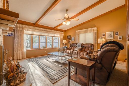 There are window blinds throughout the home. Imagine the sunset views ending your day.