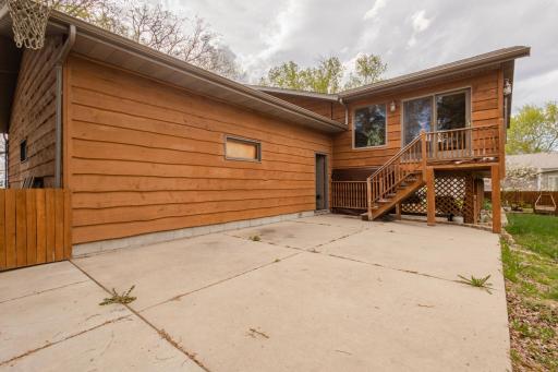 There is access from the house to the back patio by garage or Sunroom