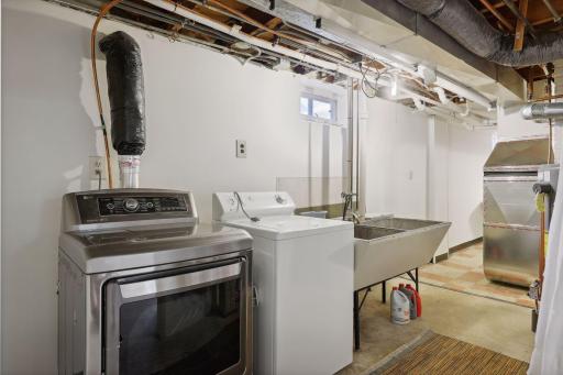 The laundry area has great functionality and the space you need to get the job done.