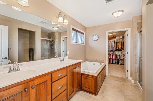 Owners suite, dual sink vanity, separate soaking tub and shower..."A great place to relax at the end of the day"