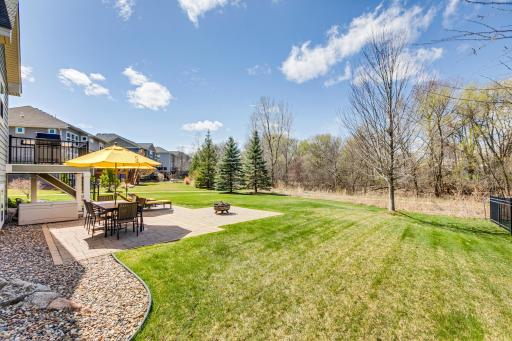 This patio seamlessly overflows into the yard, providing an abundance of space for entertaining!