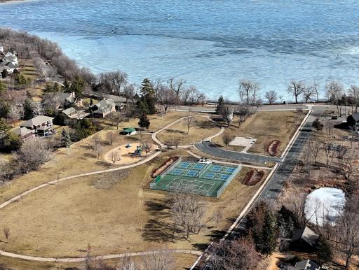 Park 1 block away, tennis, pickle ball, park and public beach on Lake Minnewashta