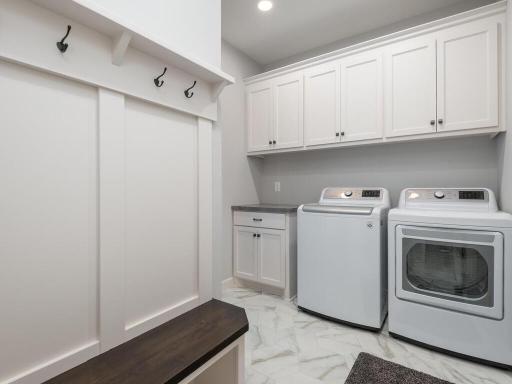 Main level Laundry/Mudroom allows for one-level living.