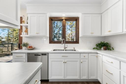 Enjoy ample cabinet space in this well-appointed kitchen.