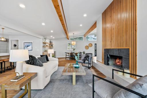 Vaulted ceilings with exposed beams wrapped in rustic alder