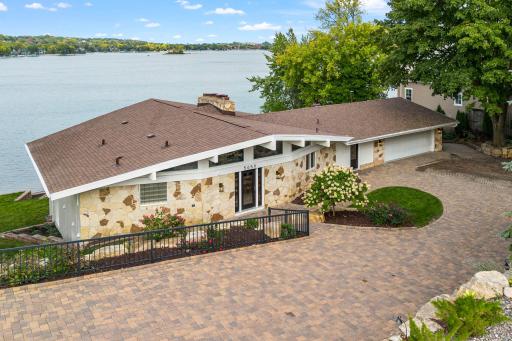 Mid Century walkout rambler with natural stone accents!