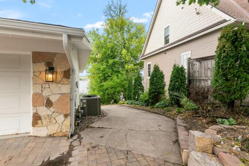 Concrete paver driveway leading to the Lower Level