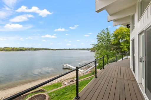 The deck extends the entire length of the home