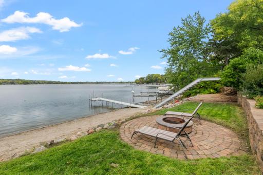 Decorative paver patio w/ built-in fire ring to enjoy the beautiful views of Lower Prior Lake