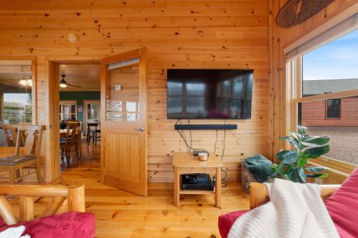 This rustic den space is perfectly outfitted with natural tongue and groove pine walls and ceilings.