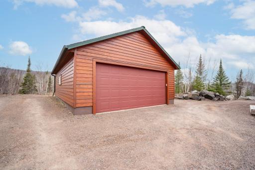 Detached garage makes life easy storing your vehicles.