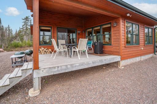 Get the grill fried up for evening dinners on this attached deck facing Lake Superior.