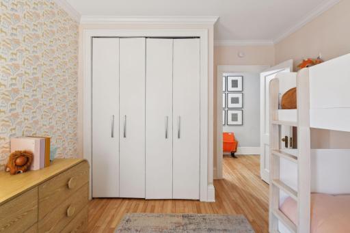 This closet has a built-in organizer to keep your belongings tidy!