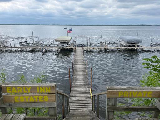 Welcome to your low maintenance, lakeside living in Early Inn Estates including your dock and slip!.jpg