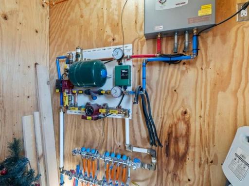 Electric boiler providing in-floor heat in garage/ shop