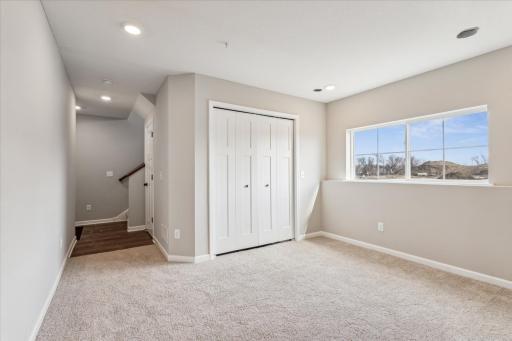 Lower Level Recreation Room with entry off garage
