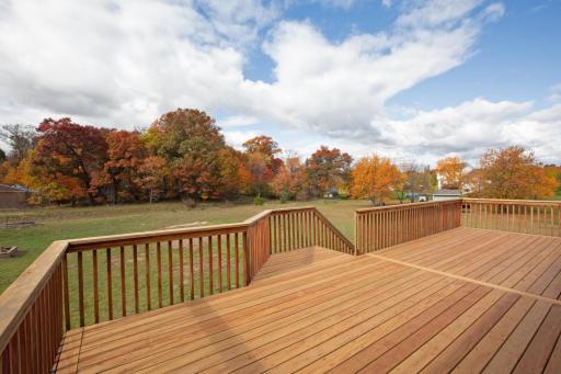 The deck overlooks a large backyard. This photo was taken in the late fall of 2023.