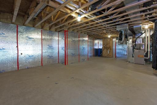 More basement space plus a view towards the utility area.