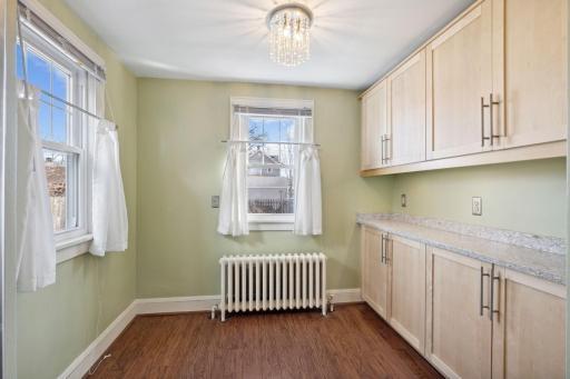 Informal dining area with more kitchen storage