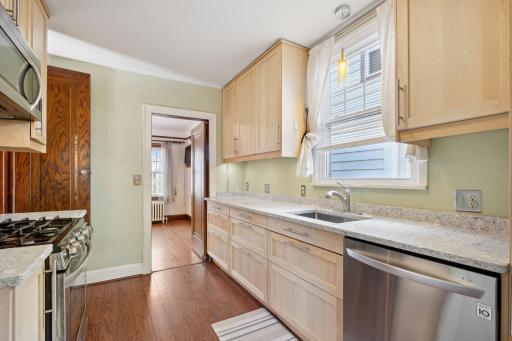 Granite countertops and abundant kitchen cabinetry