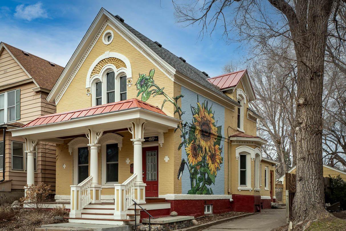 Delightful historic charm-Hand painted sunflower mural by seller