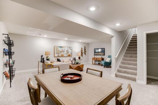 Model home shown here with finished basement, imagine the possibilities! Photos of model, colors and options will vary.