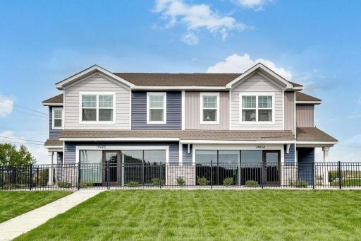 The Duet with a charming exterior from end to end. Photo of model home, color & options will vary.