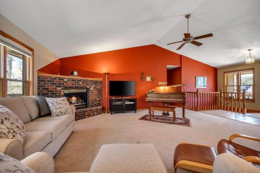 Vaulted gathering room, gas fireplace, natural light-filled, INVITING!