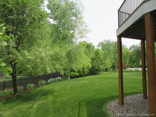 For sideyard fence and landscaping to blockwalking trail