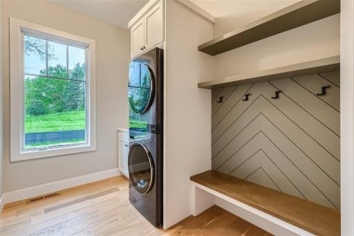 Main level laundry room, appliances included.