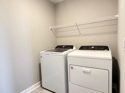 Top load washer and dryer package included with this home!