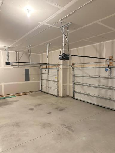 3 Stall Garage includes electric wifi connectable garage door openers for both stalls.