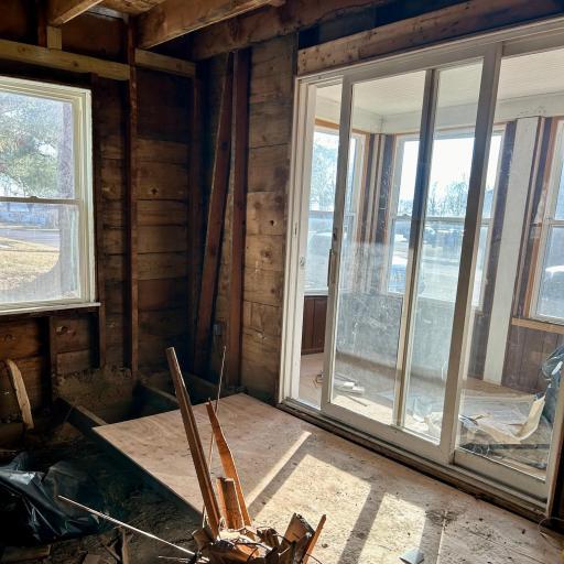 Main floor living room view to front porch