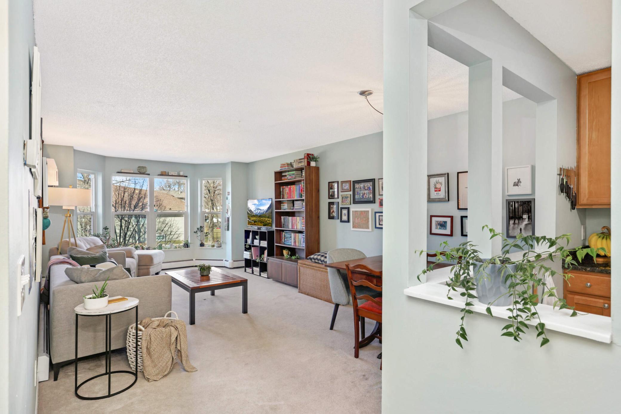 Welcome home to this inviting, spacious & private condo beaming with natural sunlight