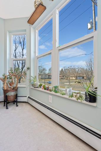 Beautiful & recently updated bay windows overlooking residential neighborhood