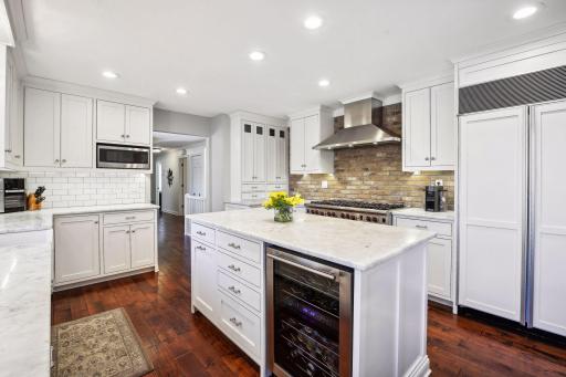 Large center island with beverage refrigerator