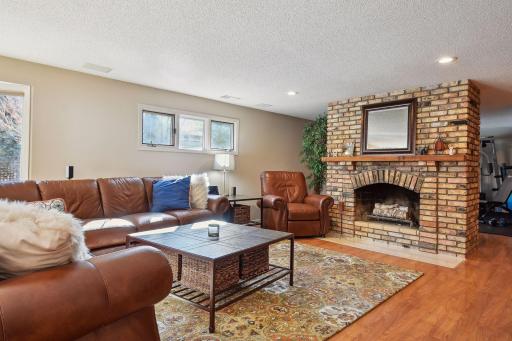 Another wood burning fireplace in the lower level family room