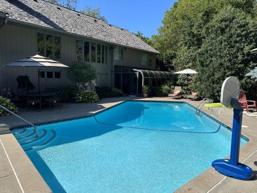Full concrete pool. This backyard is a must see