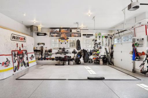 Garage-Epoxy Flooring, Sat Wall and Storage added