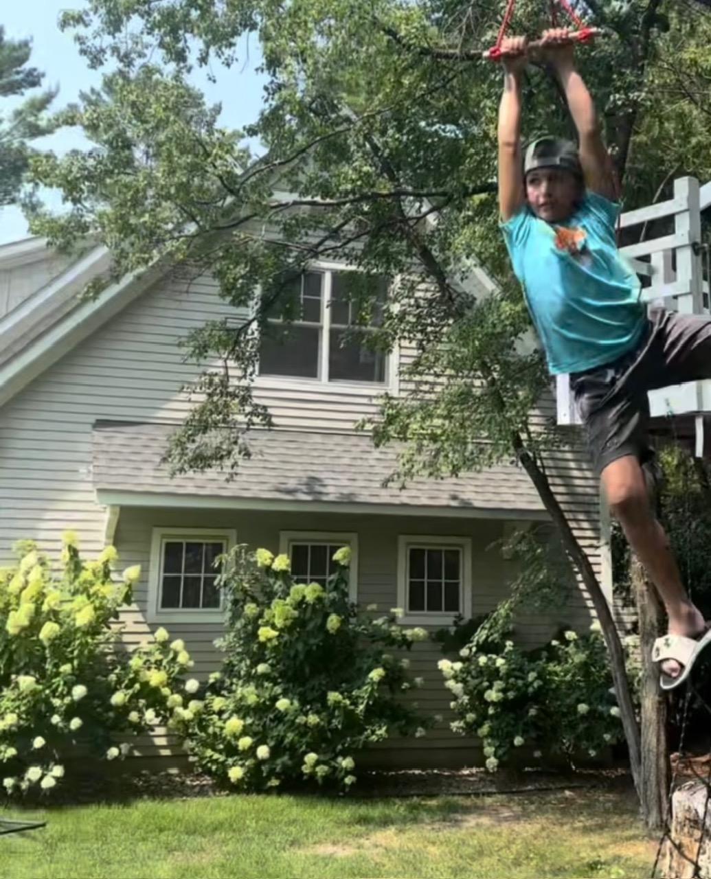 Summer Tree House and Zip LIne Fun! How about those Hydrangeas! Photo provided by homeowner.