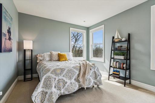 Second bedroom features 3 windows and a large walk-in closet.
