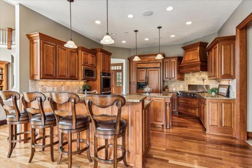 Convenient breakfast bar, plus pendant and recessed lighting.
