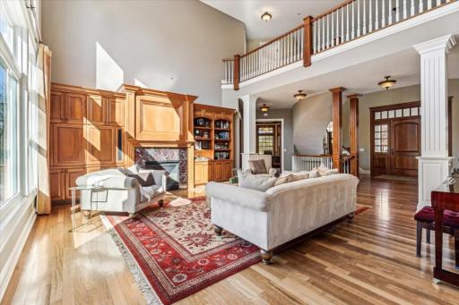 An abundance of built in cabinets and bookshelves.